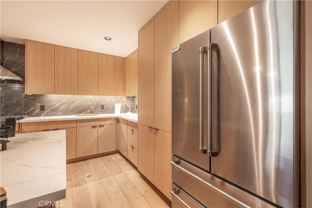 259 Victoria Sugarloaf, CA 92386 - Photo 10 of 32 a kitchen with stainless steel appliances granite countertop a refrigerator and a sink