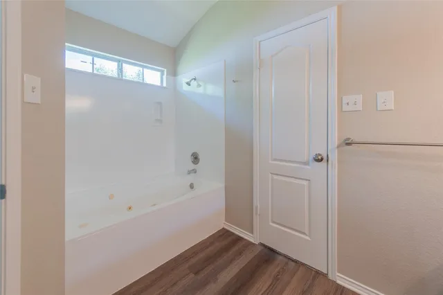 a bathroom with a bathtub