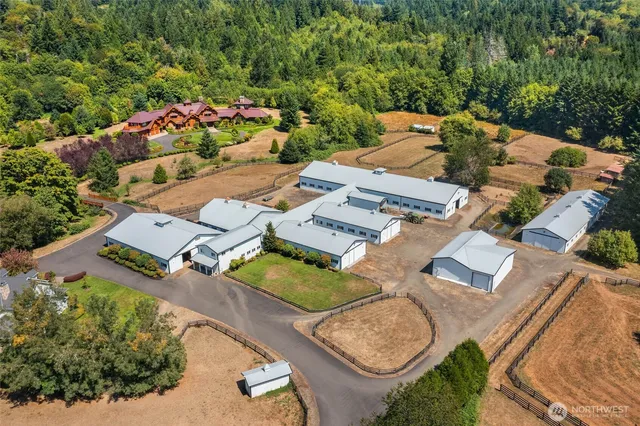 an aerial view of a house with outdoor space