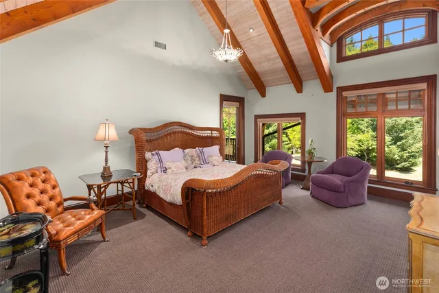 a living room with furniture fireplace and window
