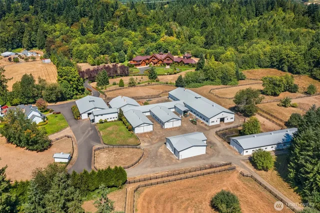 an aerial view of residential house with outdoor space