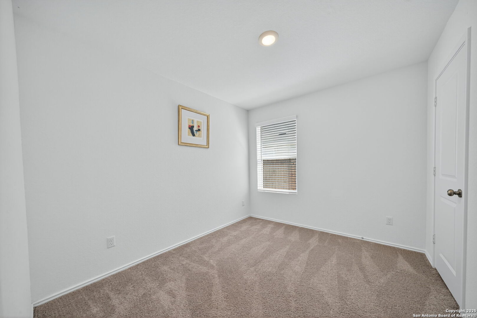 12935 Deep Eddy St. Hedwig, TX 78152 - Photo 21 of 26 an empty room with a window