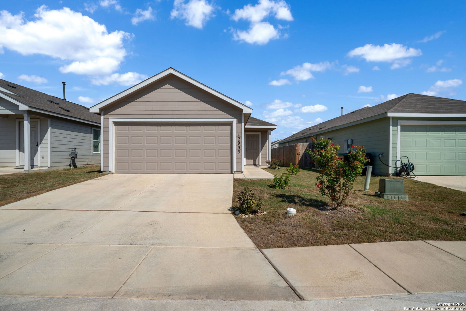 12935 Deep Eddy St. Hedwig, TX 78152 - Photo 5 of 26 a view of garage and yard