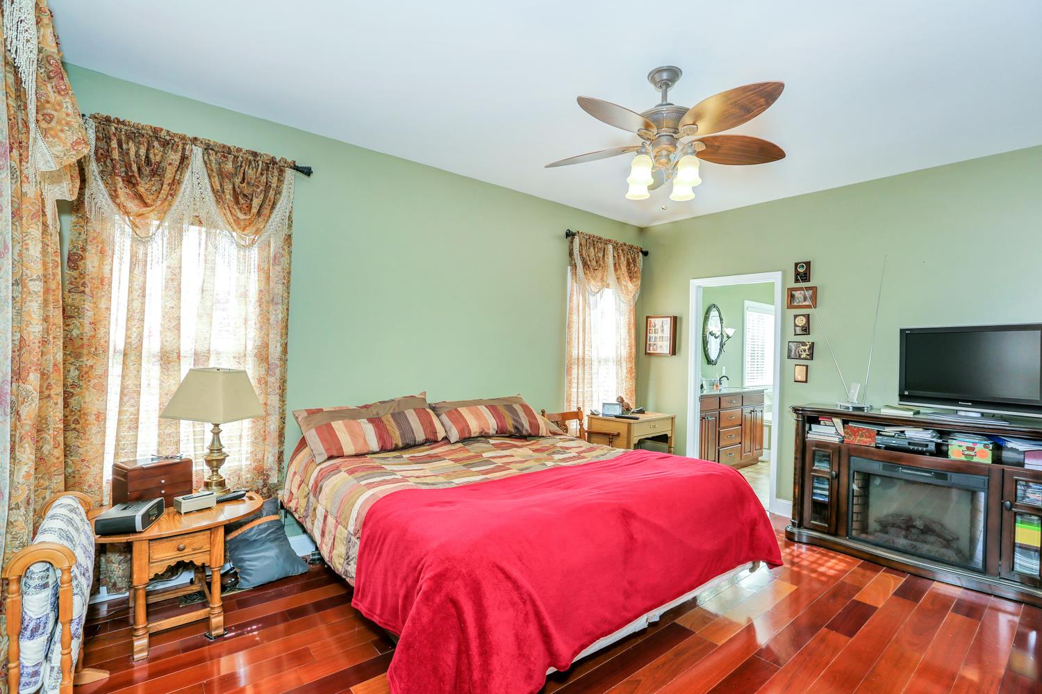 42 Partin Road Taft, TN 38488 - Photo 16 of 30 a bedroom with a bed and a flat screen tv
