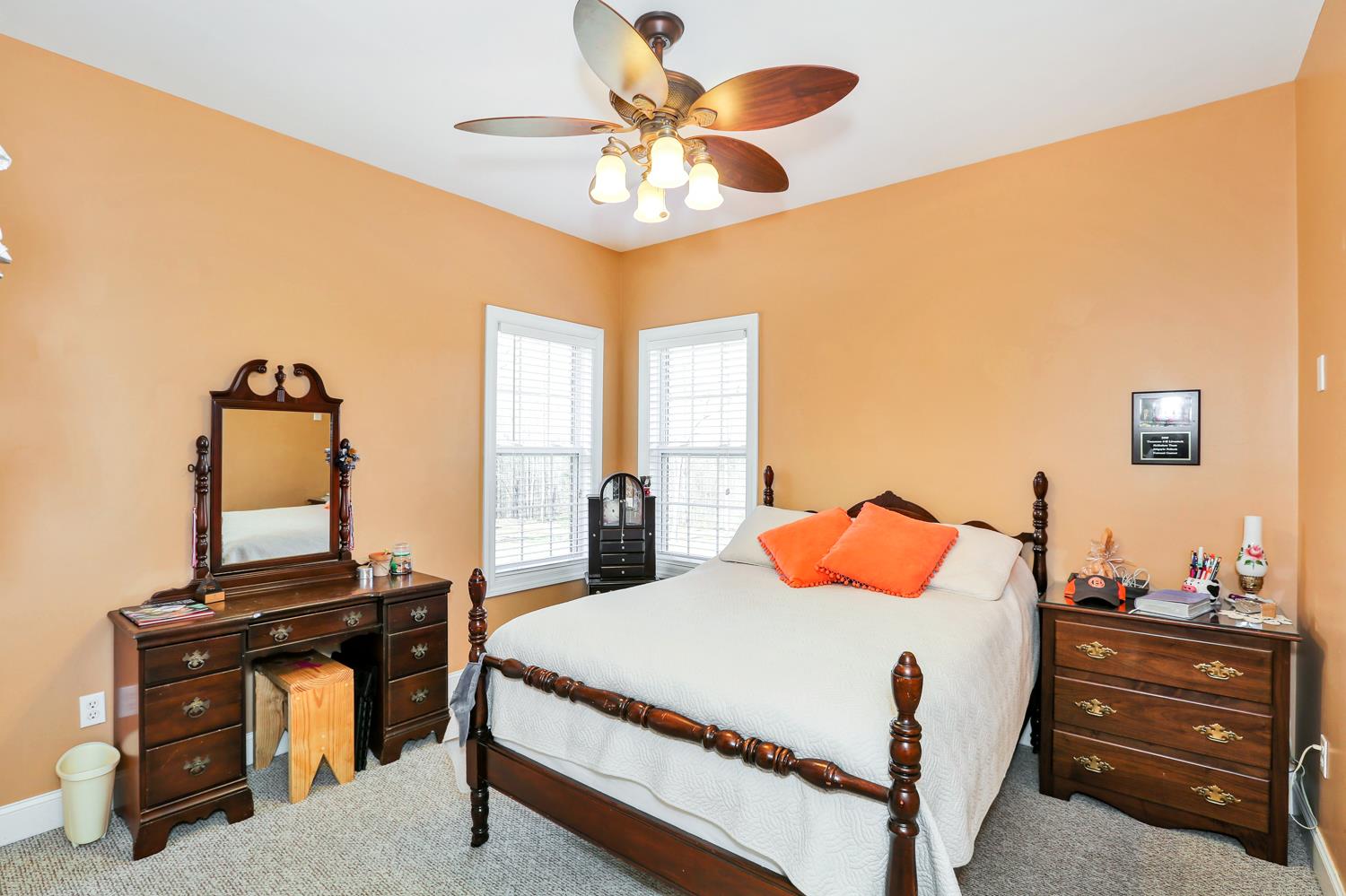 42 Partin Road Taft, TN 38488 - Photo 22 of 30 a bedroom with a bed and a chandelier