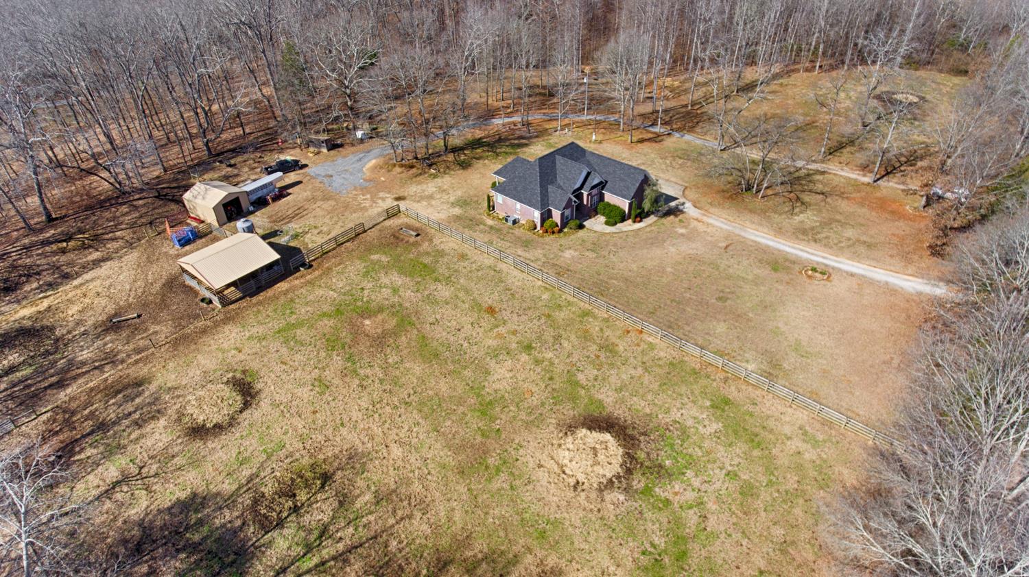 42 Partin Road Taft, TN 38488 - Photo 30 of 30 a view of backyard with wooden fence
