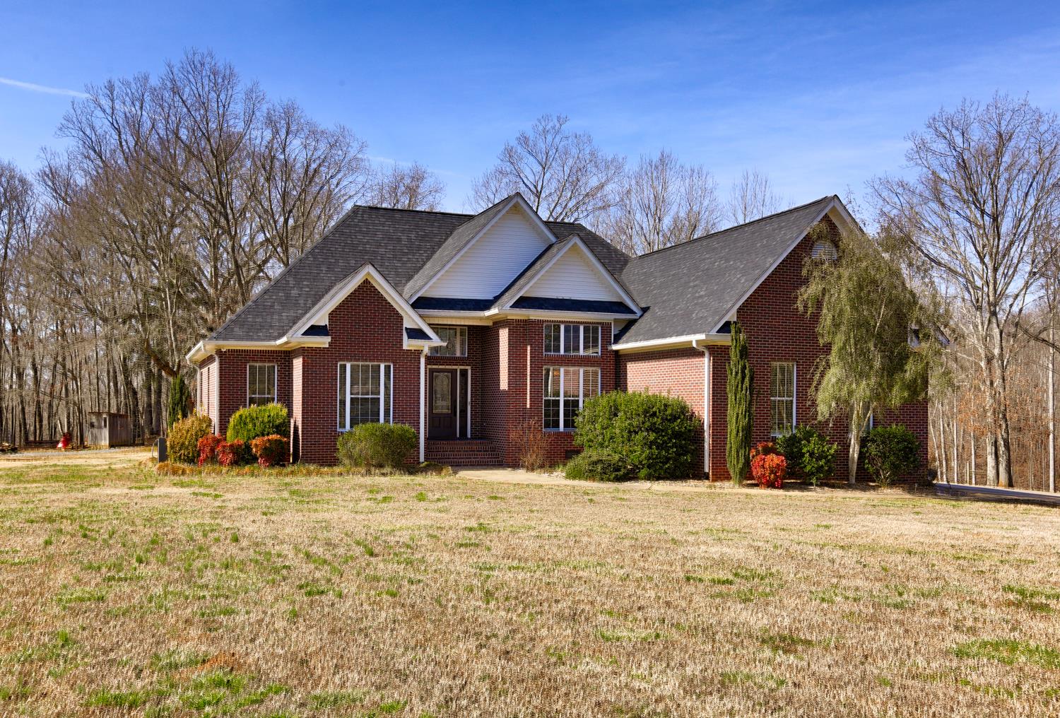 42 Partin Road Taft, TN 38488 - Photo 3 of 30 a front view of a house with a yard
