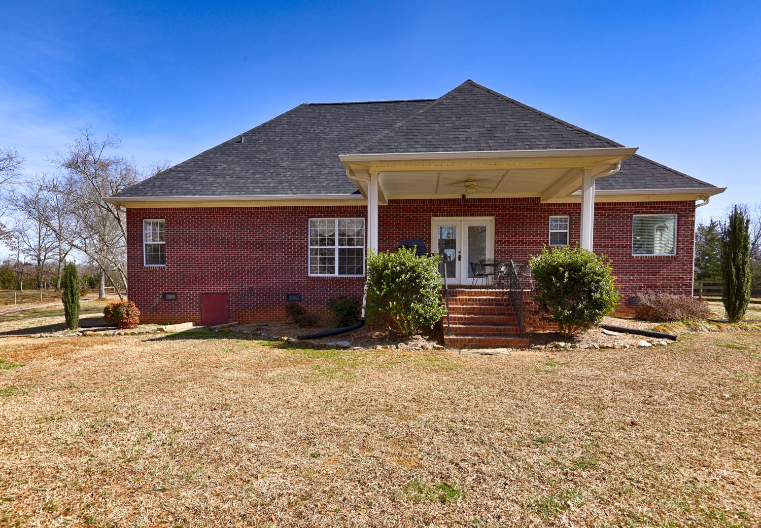 42 Partin Road Taft, TN 38488 - Photo 5 of 30 a front view of a house with a yard