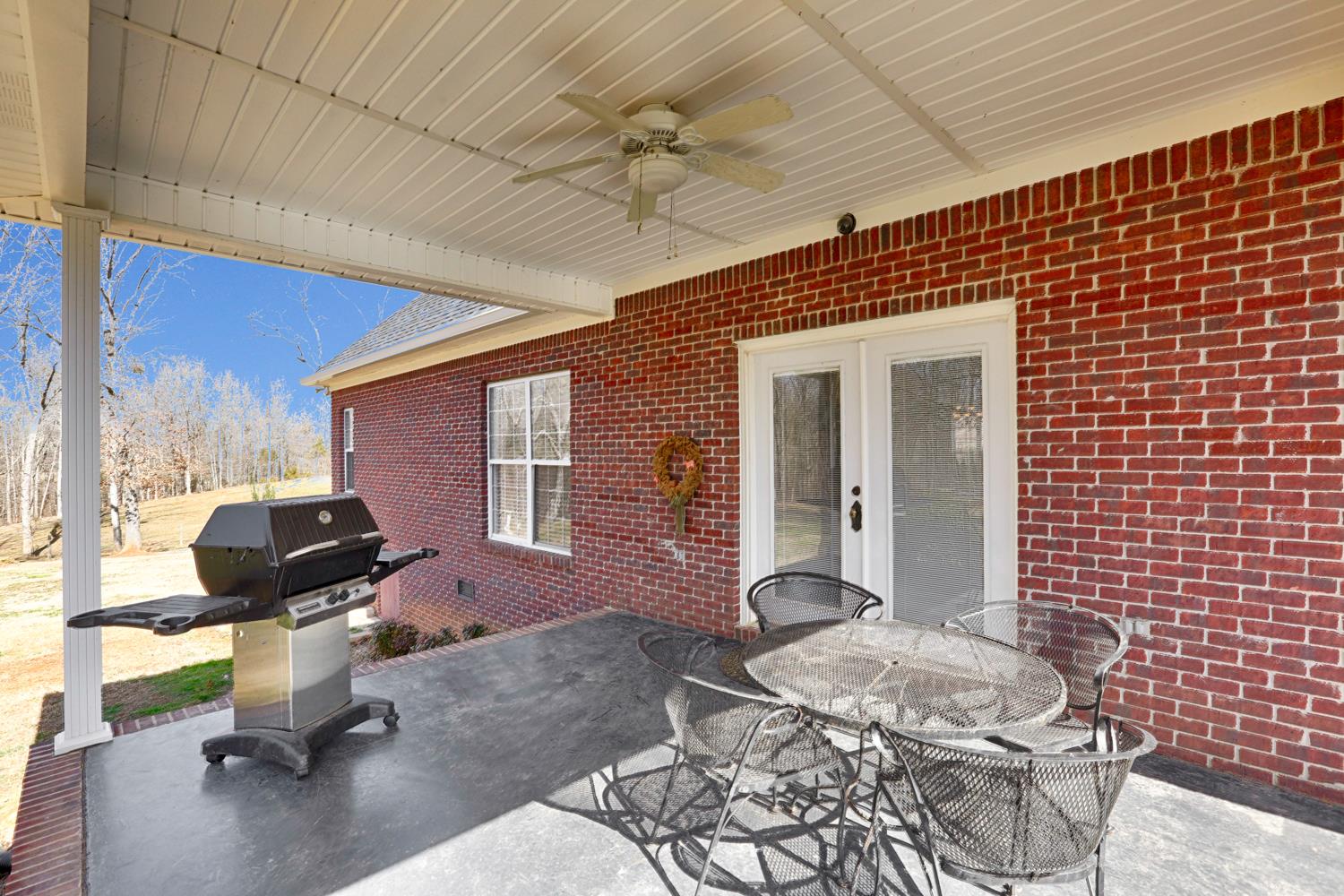 42 Partin Road Taft, TN 38488 - Photo 6 of 30 a front view of a house with patio