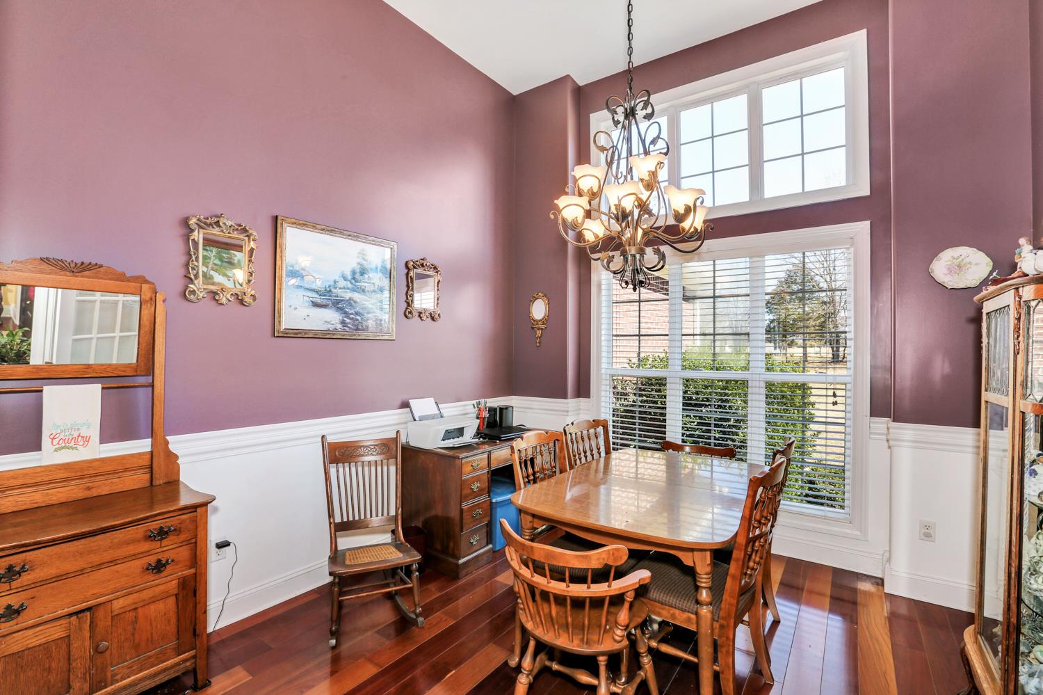 42 Partin Road Taft, TN 38488 - Photo 8 of 30 a dining room with furniture a chandelier and wooden floor