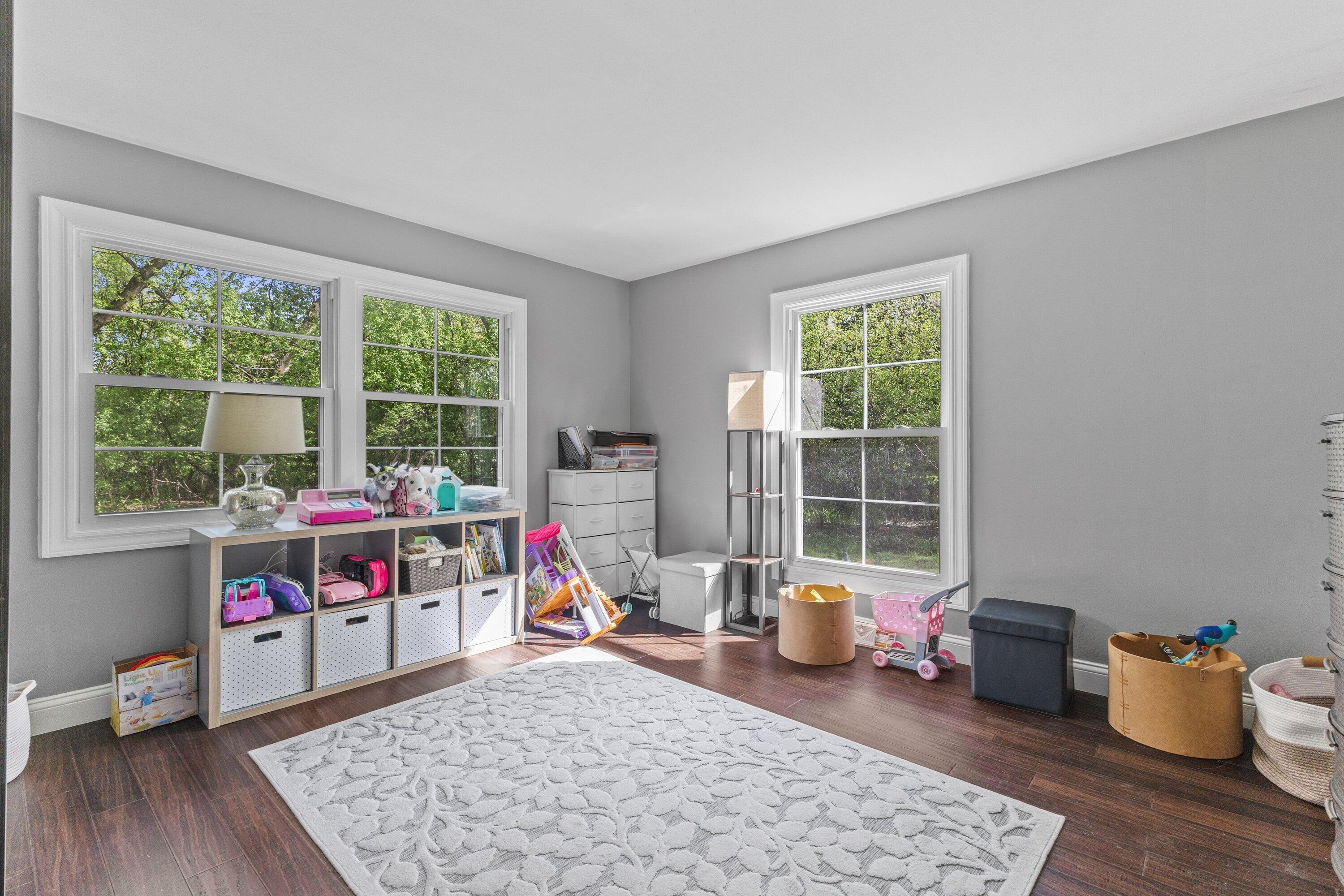 1005 Lone Tree Road Elm Grove, WI 53122 - Photo 22 of 35 main floor den
