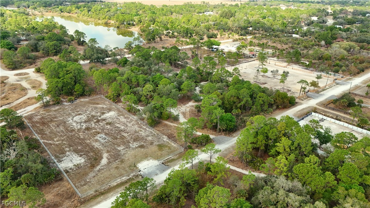 620 South Datil Street Clewiston, FL 33440 - Photo 7 of 9 an aerial view of residential houses with outdoor space and trees