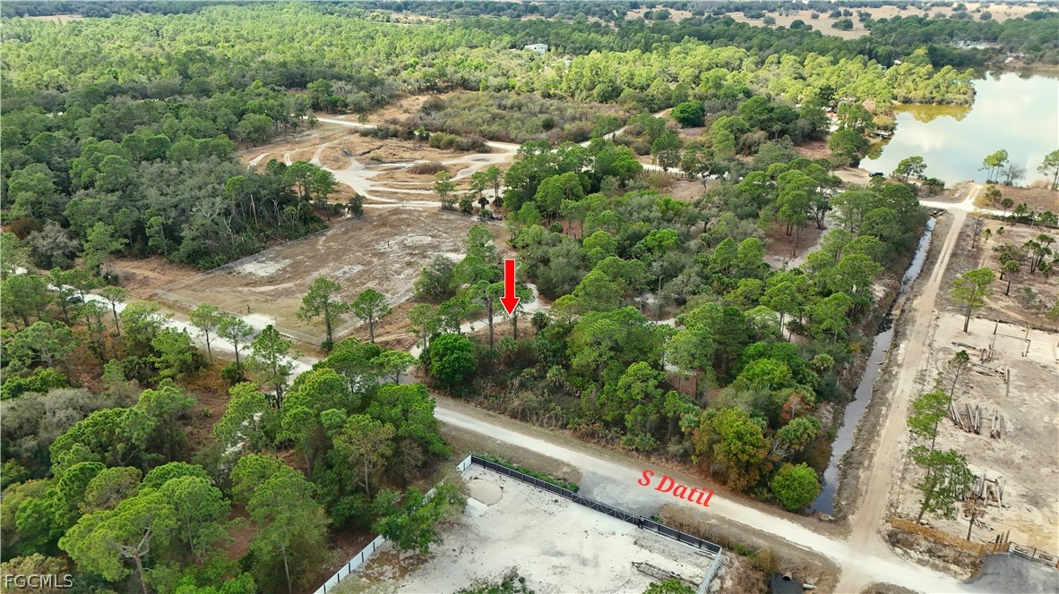 620 South Datil Street Clewiston, FL 33440 - Photo 9 of 9 an aerial view of residential house with outdoor space and trees all around