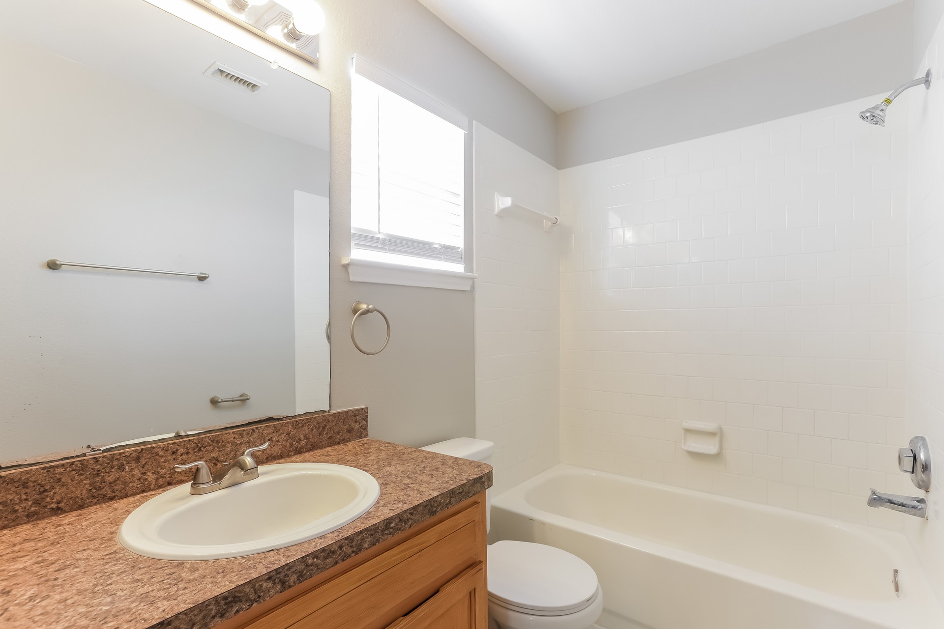 7744 Ellis Drive Houston, TX 77489 - Photo 11 of 17 a bathroom with a granite countertop sink toilet and shower