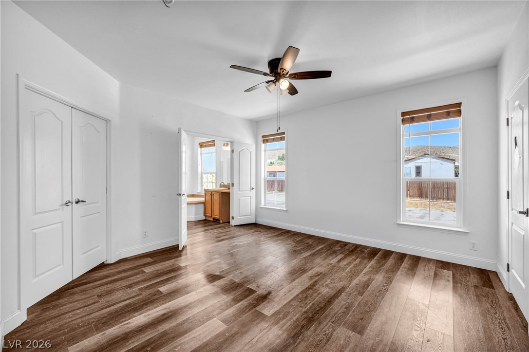 225 California Street Searchlight, NV 89046 - Photo 46 of 64 Natural light bathes this spacious interior with attractive flooring, offering comfort and style.
