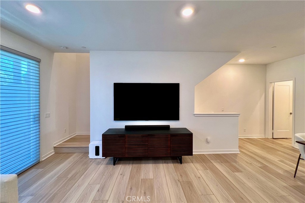 717 South Grable Circle Orange, CA 92868 - Photo 18 of 60 a living room with furniture and a flat screen tv