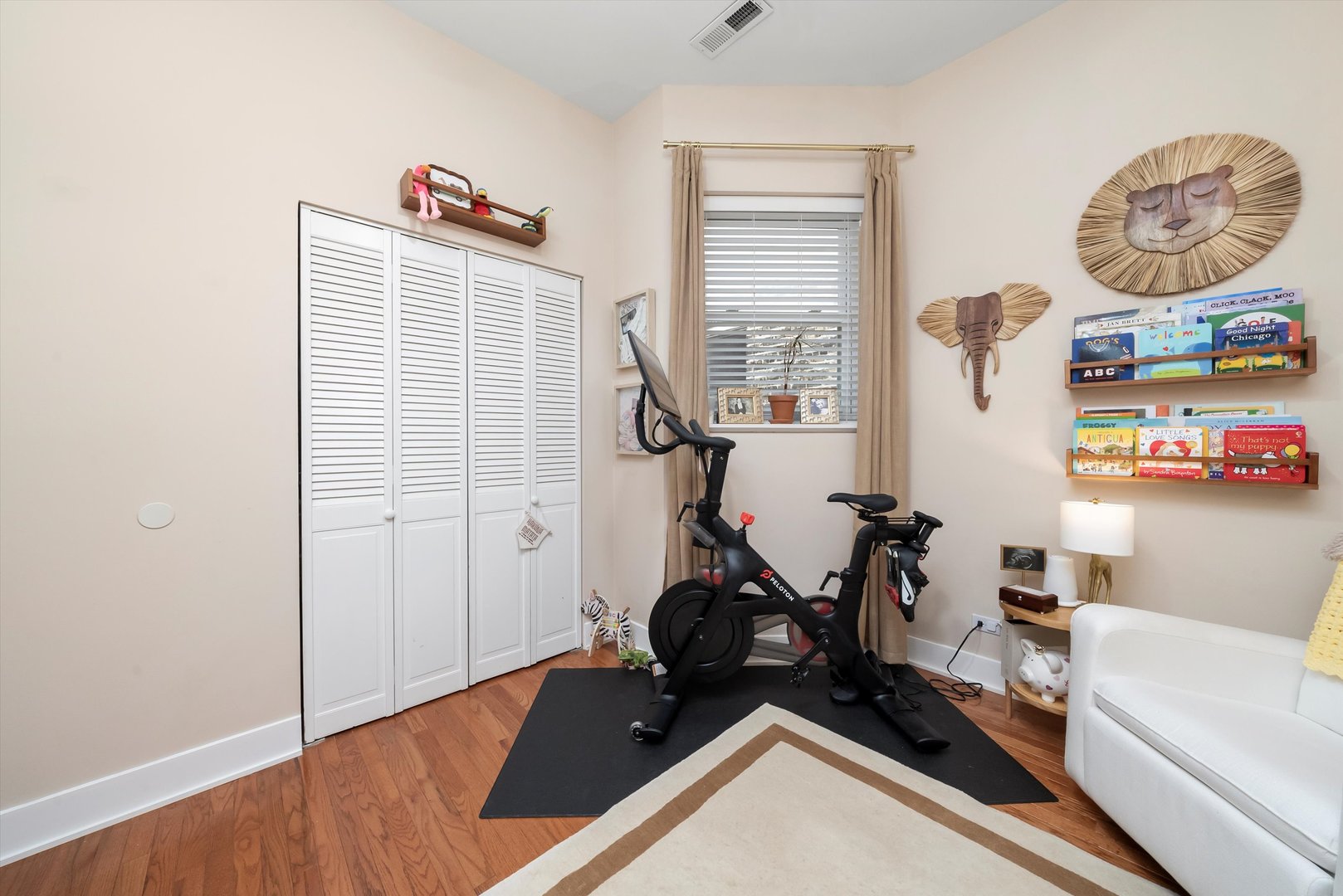 2839 North Burling Street, Unit 3N Chicago, IL 60657 - Photo 20 of 32 a view of a room with gym equipment
