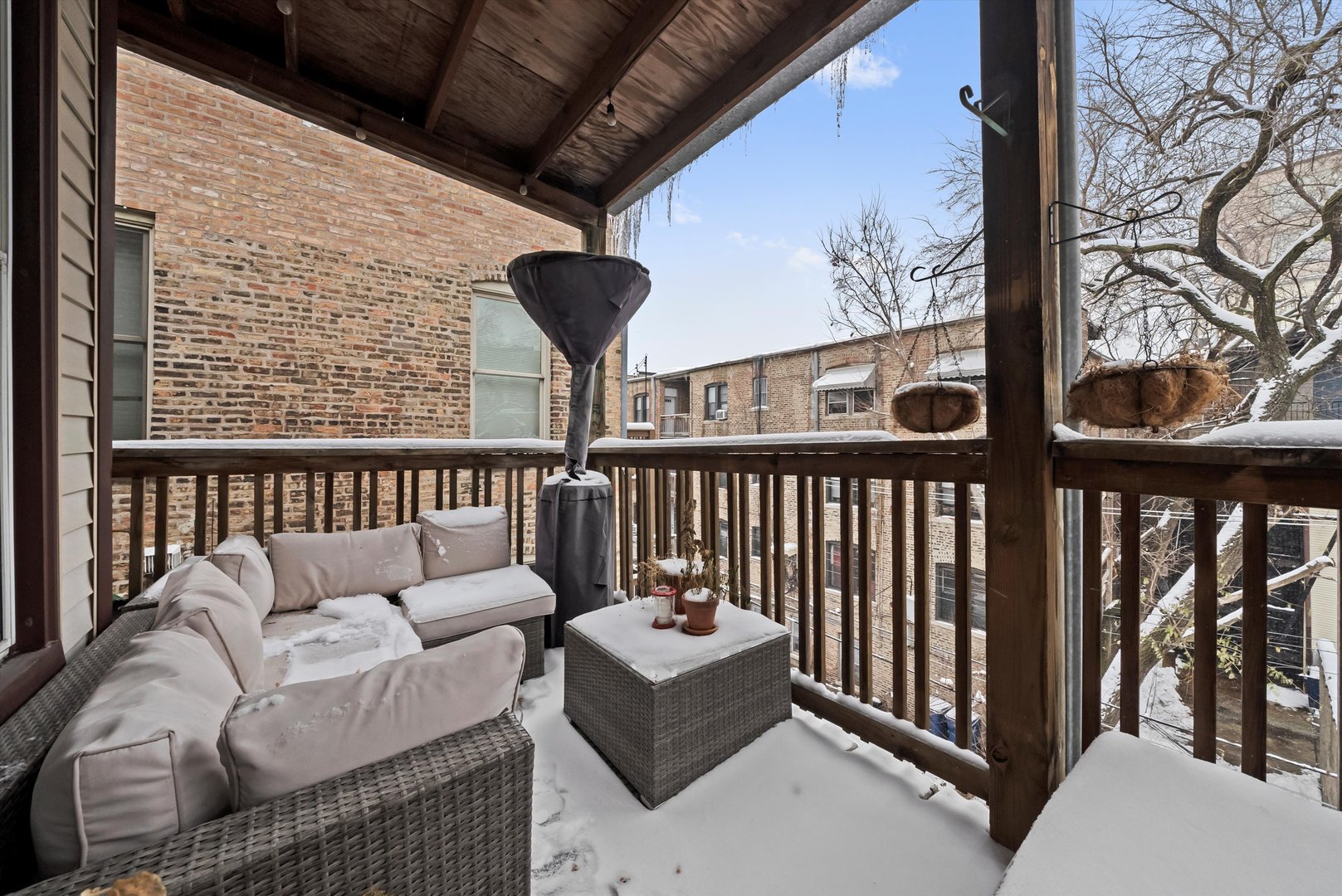 2839 North Burling Street, Unit 3N Chicago, IL 60657 - Photo 31 of 32 a balcony with wooden floor