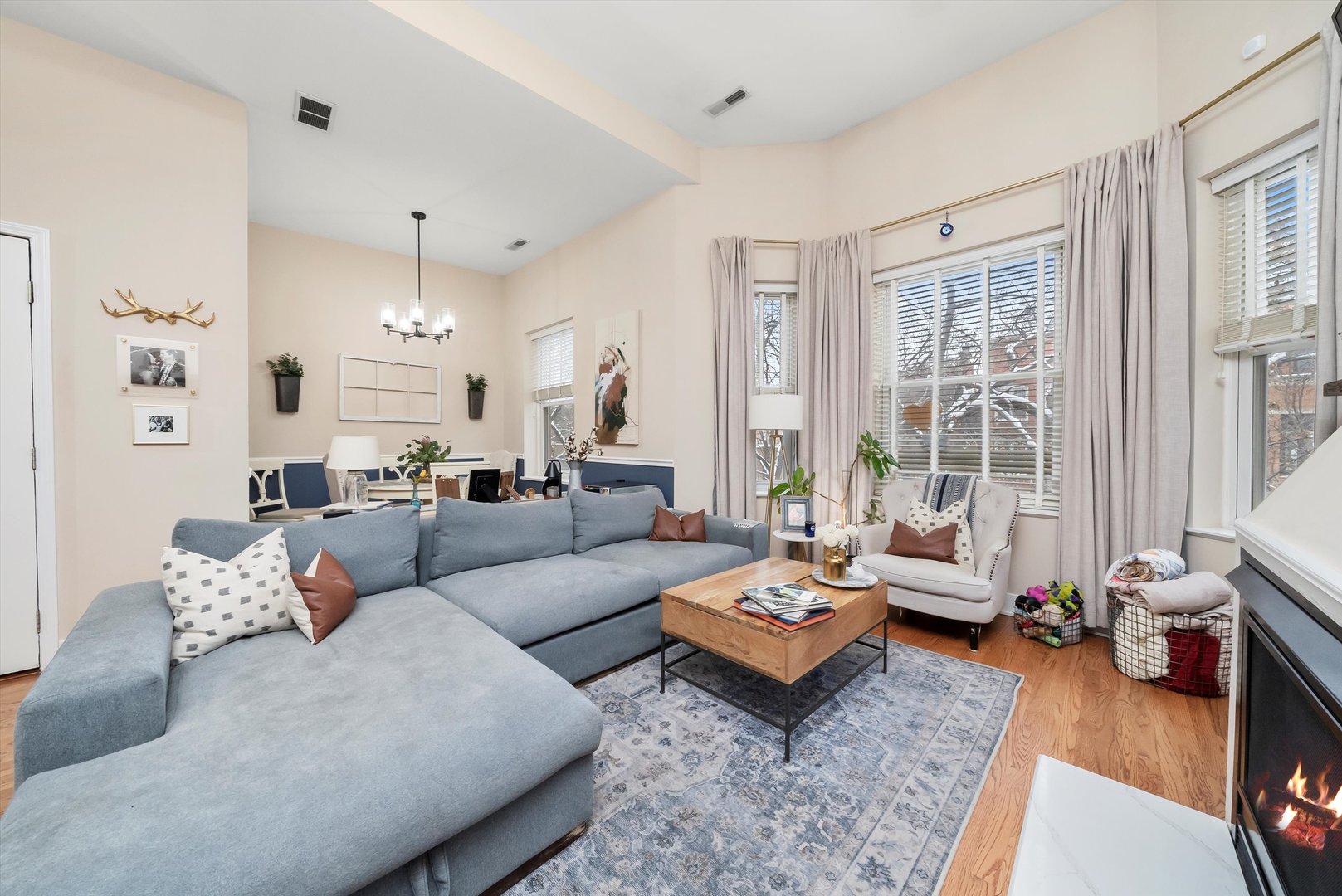 2839 North Burling Street, Unit 3N Chicago, IL 60657 - Photo 4 of 32 a living room with furniture and a large window