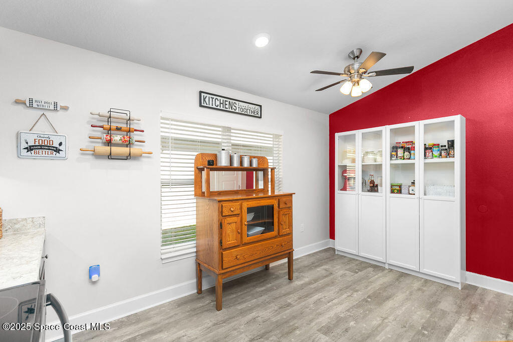 711 Tupelo Circle Cocoa, FL 32926 - Photo 13 of 47 a living room with furniture and a window