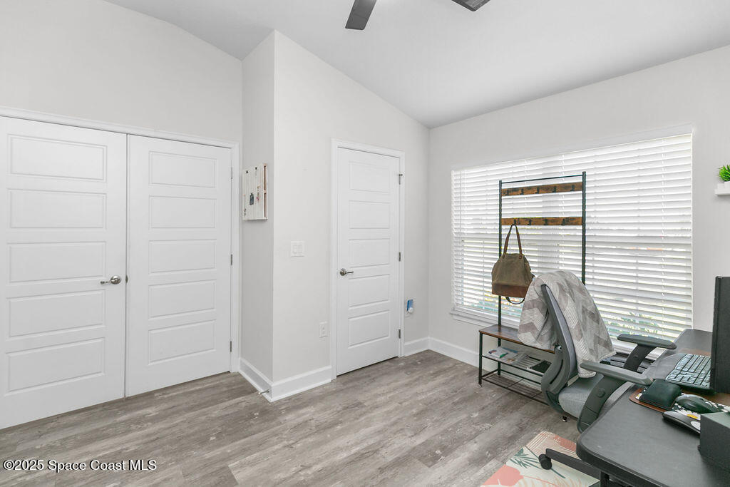 711 Tupelo Circle Cocoa, FL 32926 - Photo 33 of 47 a view of a workspace with furniture and a window