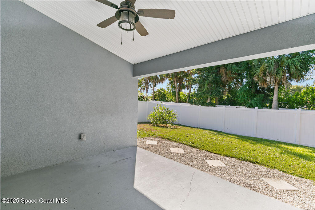 711 Tupelo Circle Cocoa, FL 32926 - Photo 36 of 47 a view of swimming pool with a yard