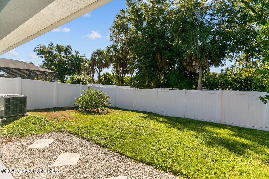 711 Tupelo Circle Cocoa, FL 32926 - Photo 37 of 47 a view of backyard with garden