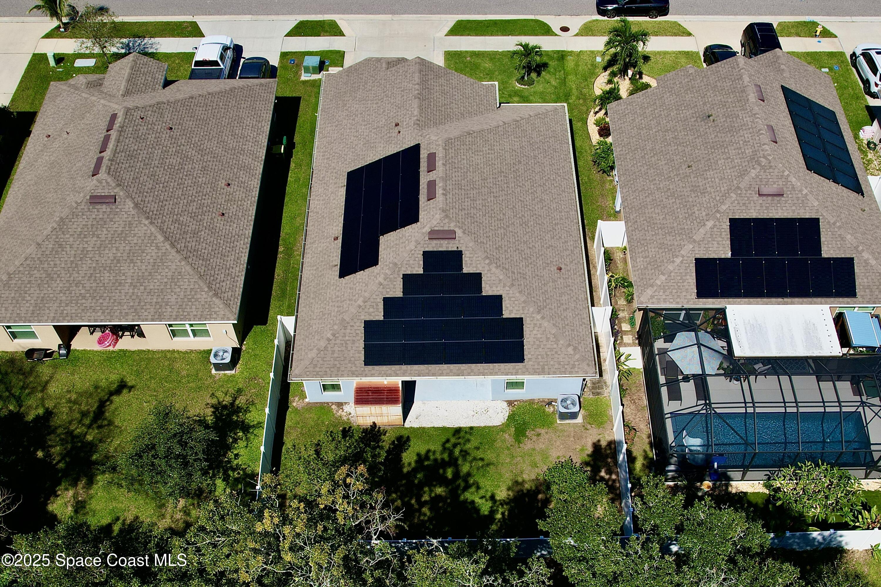 711 Tupelo Circle Cocoa, FL 32926 - Photo 44 of 47 an aerial view of a house with a yard