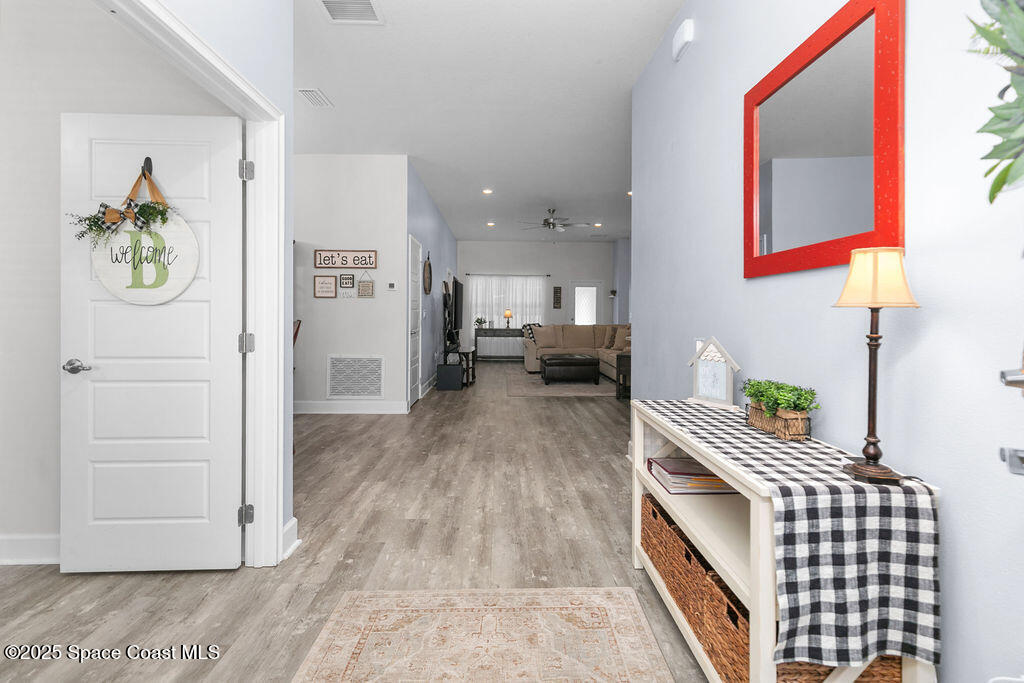 711 Tupelo Circle Cocoa, FL 32926 - Photo 5 of 47 a living room with furniture and a couch