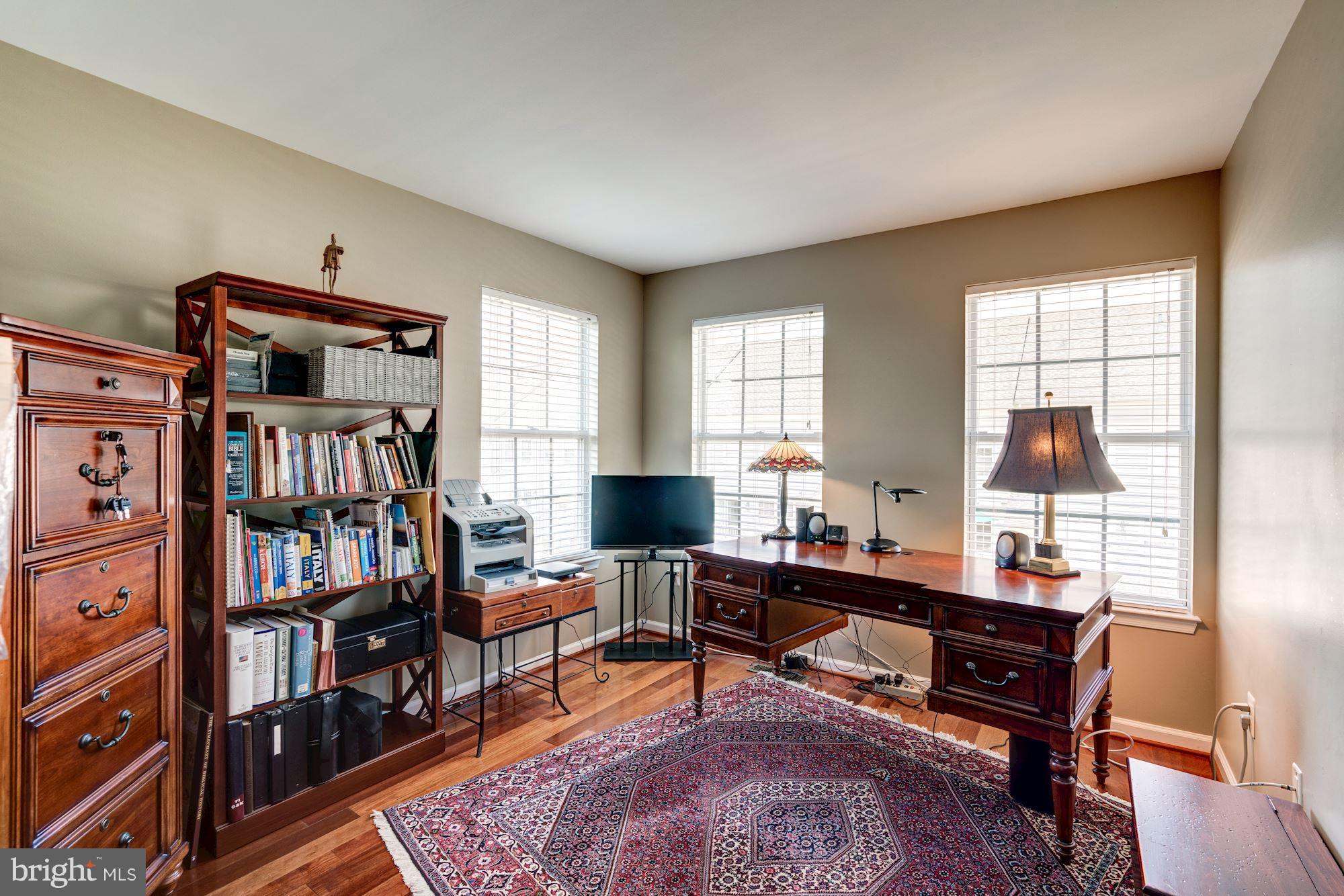 12099 Trumbull Way Reston, VA 20190 - Photo 28 of 30 Brazilian cherry floors, wrap windows