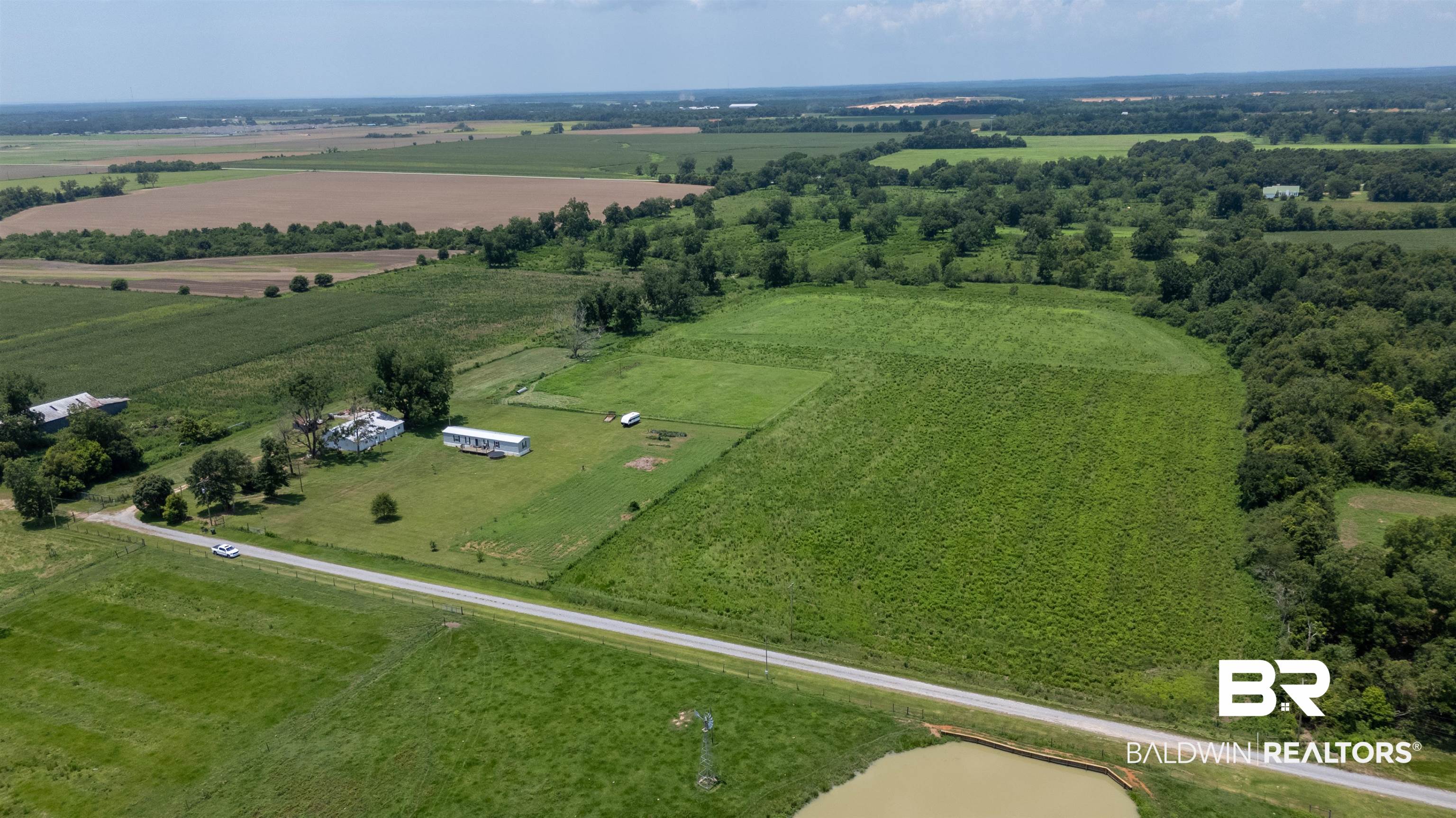 15575 Mikkelsen Road Summerdale, AL 36580 - Photo 59 of 68 Expansive rural property featuring cultivated fields and mature tree lines