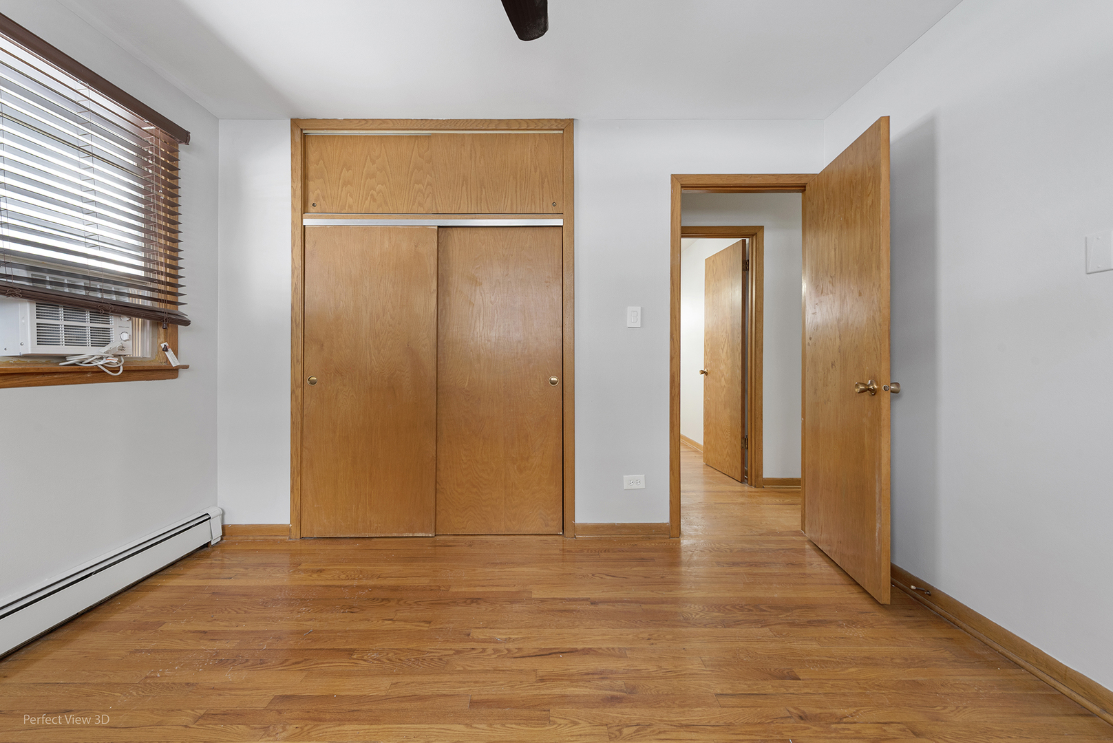 10900 Rutherford Avenue Worth, IL 60482 - Photo 14 of 21 a view of empty room with wooden floor
