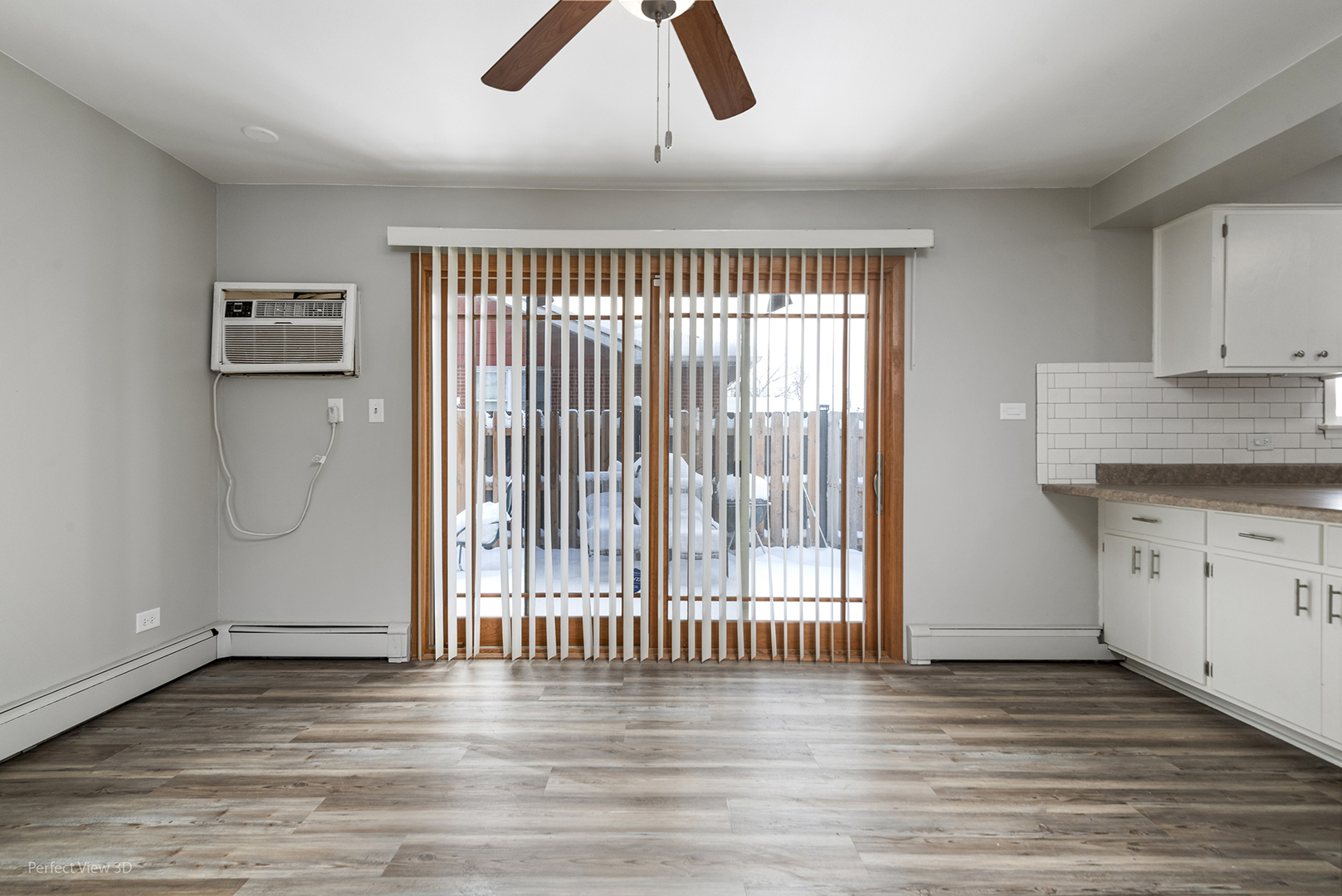 10900 Rutherford Avenue Worth, IL 60482 - Photo 6 of 21 wooden floor in an empty room with a window