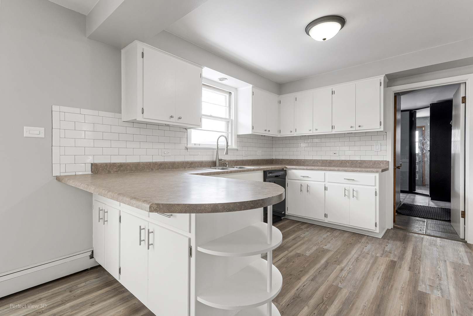 10900 Rutherford Avenue Worth, IL 60482 - Photo 8 of 21 a kitchen with a sink cabinets and window