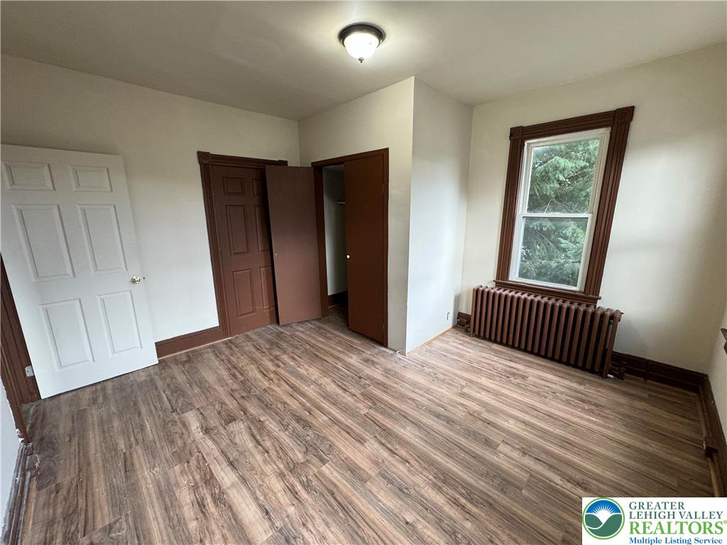 1503 Washington Street, Unit 2 Wilson, PA 18042 - Photo 20 of 28 a view of a room with wooden floor and window
