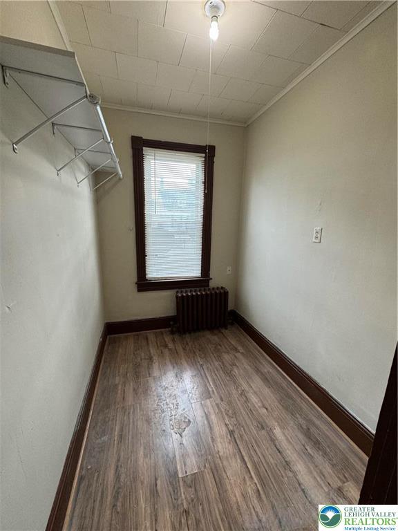 1503 Washington Street, Unit 2 Wilson, PA 18042 - Photo 23 of 28 an empty room with wooden floor and windows