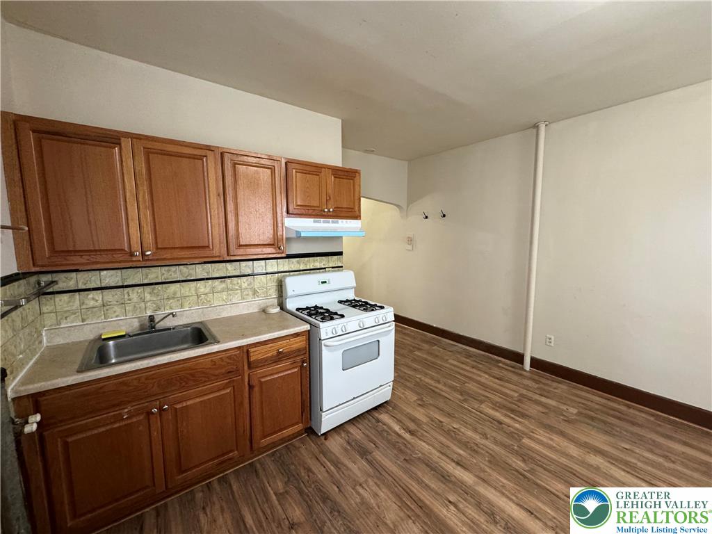 1503 Washington Street, Unit 2 Wilson, PA 18042 - Photo 8 of 28 a kitchen with a sink and cabinets