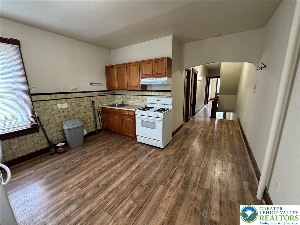 1503 Washington Street, Unit 2 Wilson, PA 18042 - Photo 9 of 28 a kitchen with a sink and wooden floor