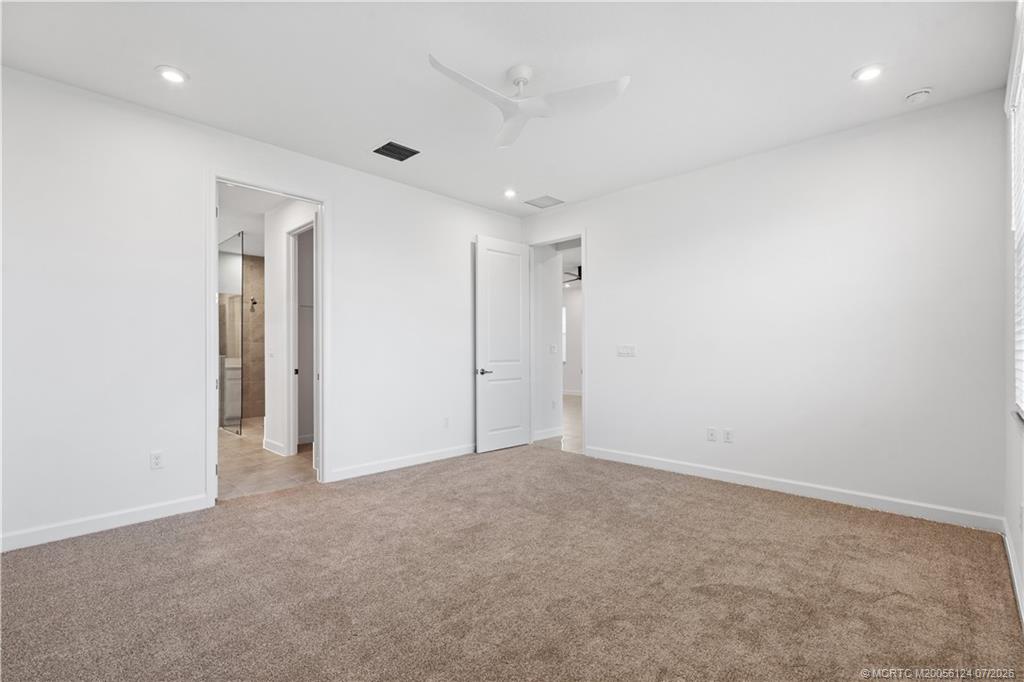 9731 Southwest Indra Way Port St. Lucie, FL 34987 - Photo 16 of 33 Primary Room
