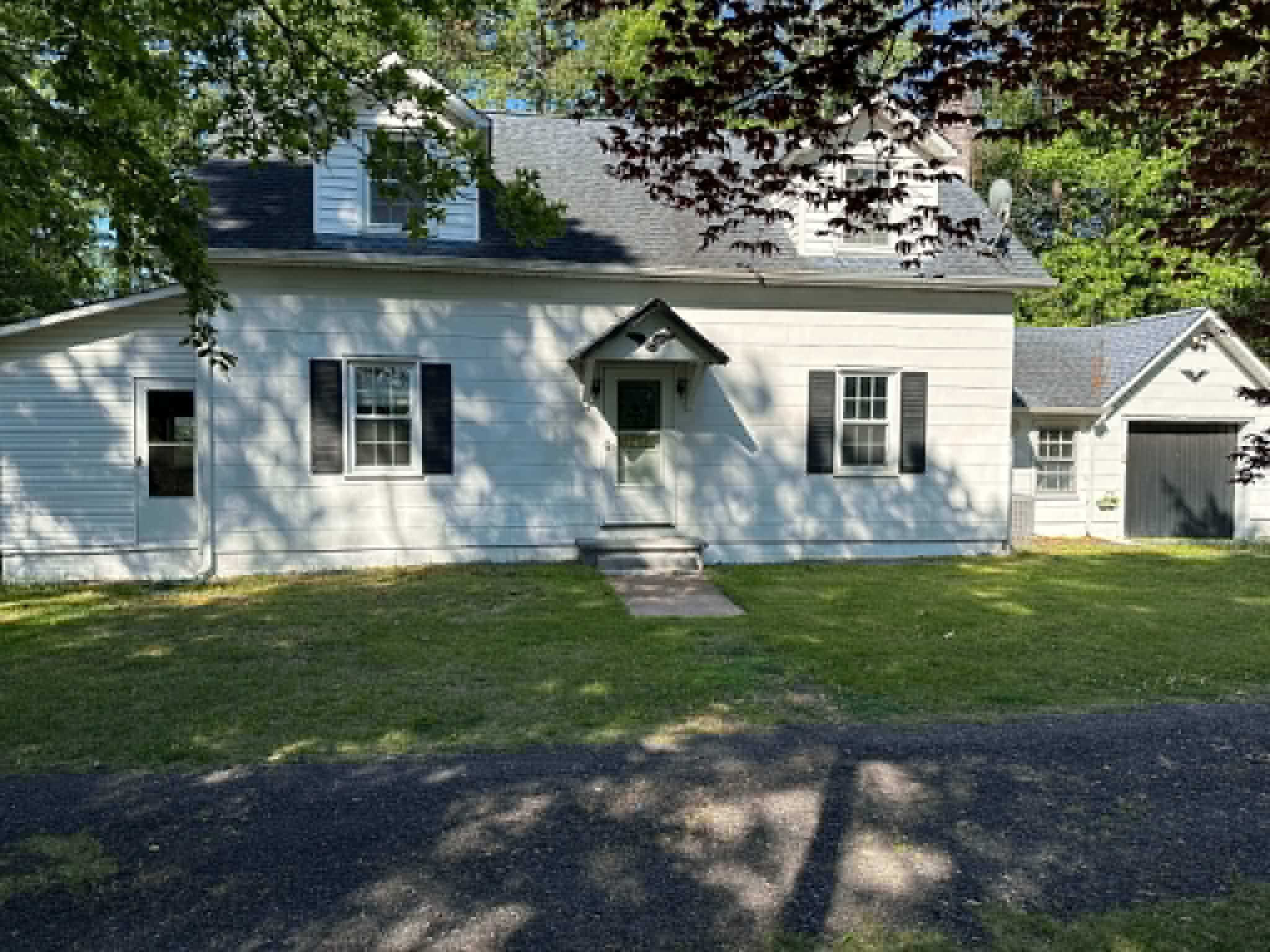 317 Magnolia Road Pemberton, NJ 08068 - Photo 2 of 42 a front view of a house with a yard