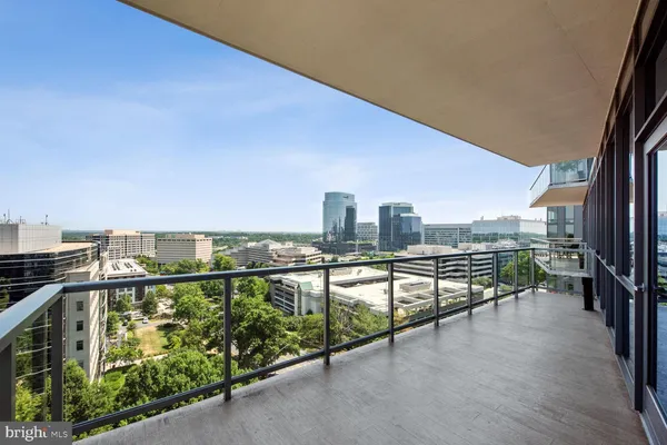 a view of a city skyline from a balcony