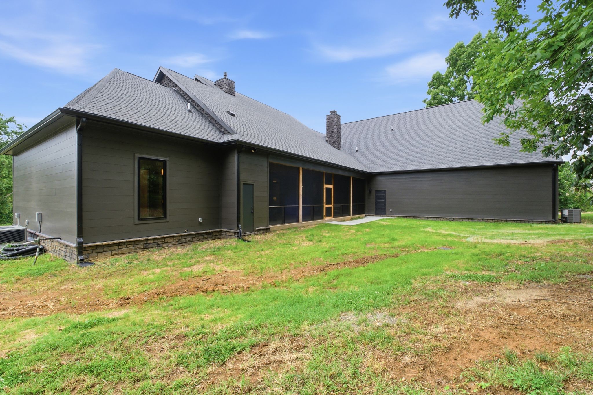 1002 Waller Road Brentwood, TN 37027 - Photo 53 of 54 a brick house with a yard