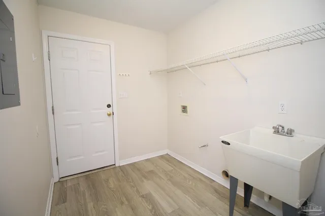 a bathroom with a sink and shower