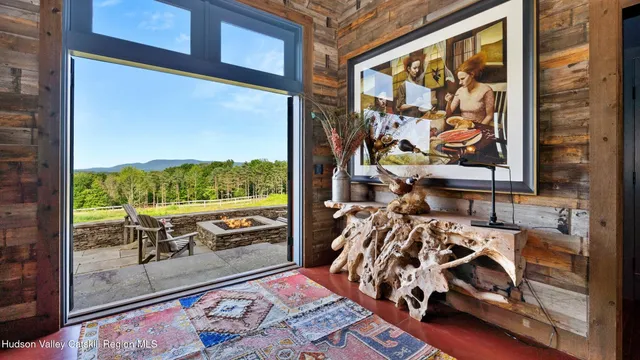 a view of a dining room with furniture window and outside view