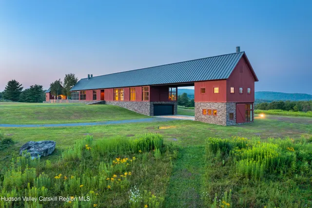 a view of field with tall trees