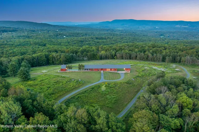 a view of a house with a big yard