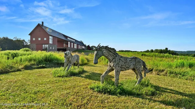 a view of a balcony with chairs