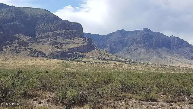 a view of mountains and valleys