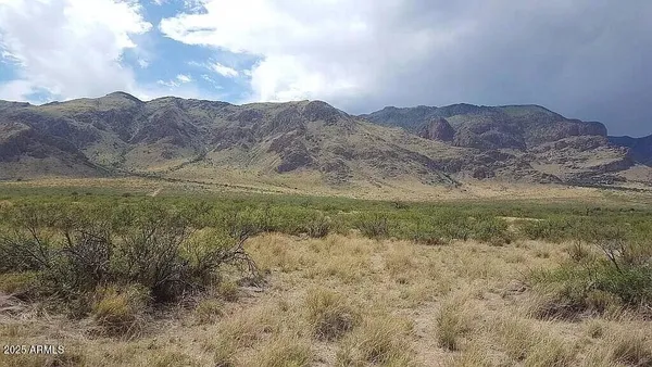 a view of mountain with lake view