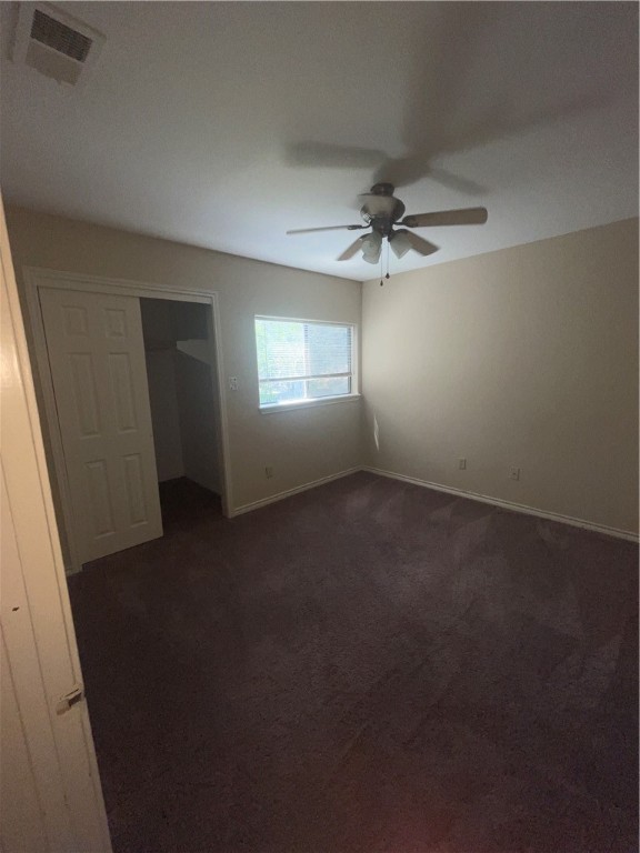 6706 Northgate Drive Corpus Christi, TX 78413 - Photo 7 of 8 an empty room with windows and fan